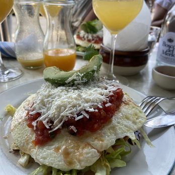 June's - Breakfast chalupa and pineapple mimosa - Breakfast & Brunch Near Me - Austin, Texas June's - Breakfast chalupa and pineapple mimosa - Breakfast & Brunch Near Me - Austin, Texas
