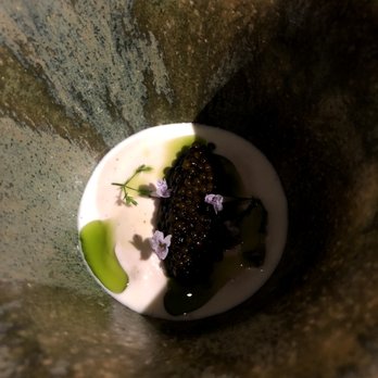 Atomix - Simmered vegetable dish with fresh Korean cheese, pine nut milk, chive oil, caviar, and artichokes - Korean Near Me - New York, New York