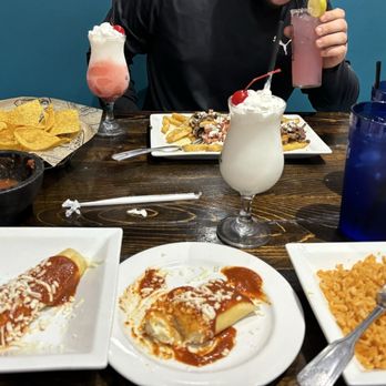 One Night Taco Stand - Side of cheese enchilada, bean burrito, rice Drinks - Frozen Pina Colada + Miami Vice - Tacos Near Me - Orange Park, Florida One Night Taco Stand - Side of cheese enchilada, bean burrito, rice Drinks - Frozen Pina Colada + Miami Vice - Tacos Near Me - Orange Park, Florida