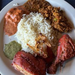 Chicken Tandoori, butter chicken, rice, ground chicken curry.