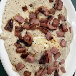 Cowboy Benedict- Biscuits, Eggs Over Easy, GRAVY & Ham