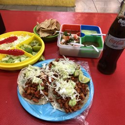 The 3 taco plate special with a bottle of soda all for under $5 bucks US with tip! Hard to beat. The 3 taco plate special with a bottle of soda all for under $5 bucks US with tip! Hard to beat.