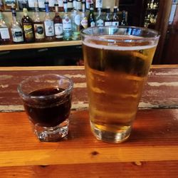 The single malt selection in the background. A PBR with a double shot of Fernet.