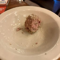Single meatball - no sauce and pink inside Single meatball - no sauce and pink inside