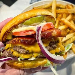 LP MKE - LP Burger ($14) with bacon ($2.50).