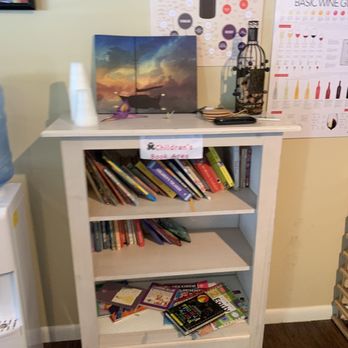 Black Bear Wine and Words - a bookshelf with books - Used Bookstore Near Me - McHenry, Maryland