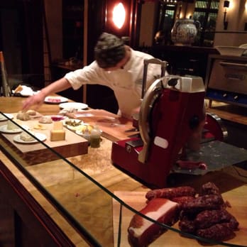 Cinghiale - Upon entering restaurant, there's a guy cutting cheeses and cured meats. - Italian Near Me - Baltimore, Maryland Cinghiale - Upon entering restaurant, there's a guy cutting cheeses and cured meats. - Italian Near Me - Baltimore, Maryland