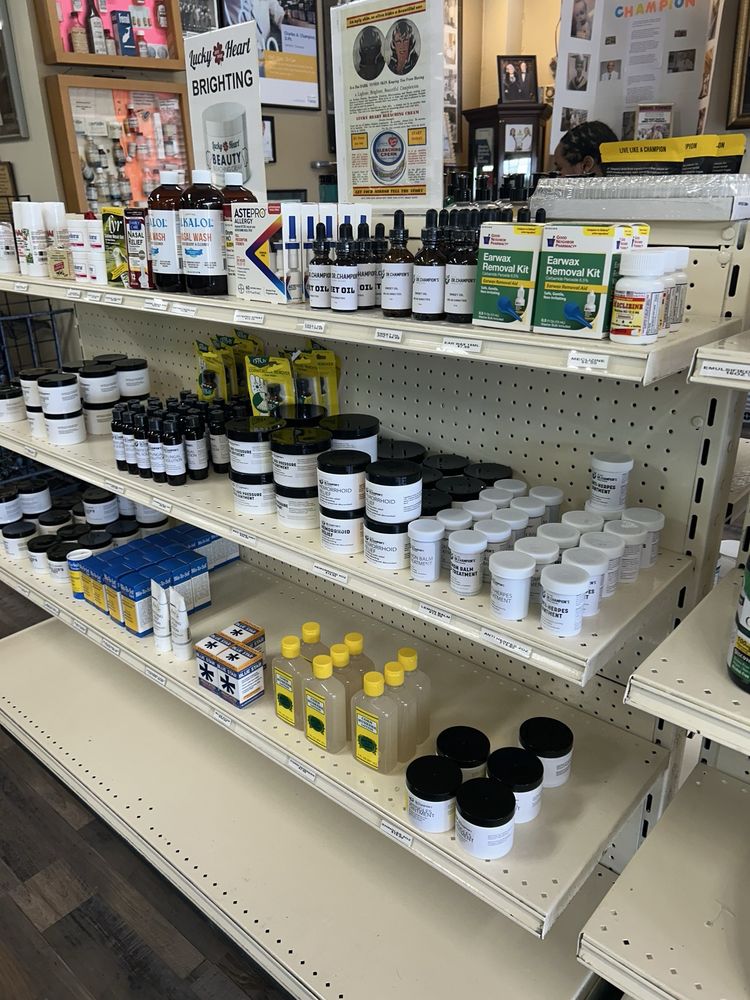 Champion's Pharmacy & Herb Store Logo