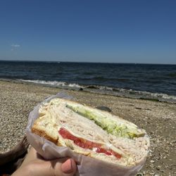 Leo's Deli - Turkey & swiss on a roll with lettuce, tomato, pickles, mayo & black pepper