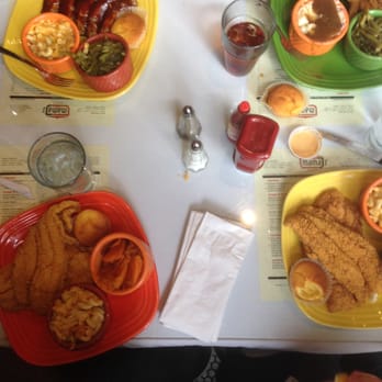 Mama J's Kitchen - A quick snap before everyone dug in! Catfish, ribs, fried chicken and sides. - Soul Food Near Me - Richmond, Virginia