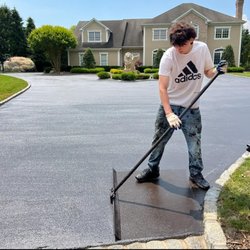 United Blacktop - Sealcoating a blacktop driveway in Suffolk County, NY