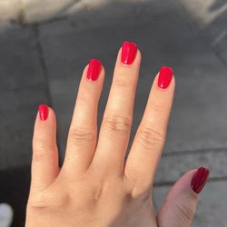 IBIZA Nails & Beauty - Hard gel on natural nails, rounded square with OPI Got the Blues for Red gel.