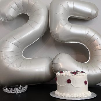 Ashley’s Sugar On Top - White cake with Raspberry filling and lemon buttercream (custom piping design) - Cupcakes Near Me