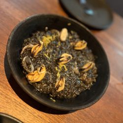 Acamaya - Hot seafood dish with rice and black squid ink