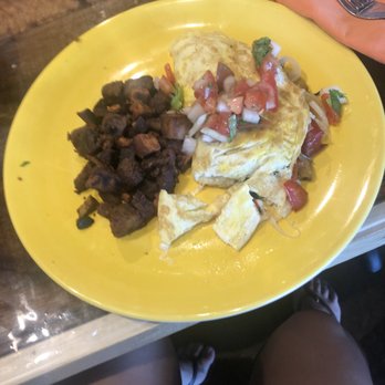 Moku Roots - Breakfast omelette. Lol I am always so hungry I forget to take a picture before a bite - Vegan Near Me - Kula, Hawaii