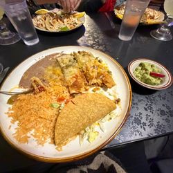 Imperio Azteca  - Combination plate: Ground beef taco, chicken enchilada, and tamale-Christmas style.
