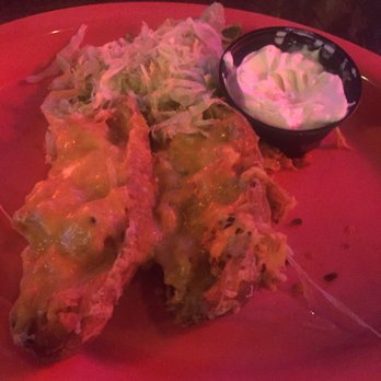 Hangar Pub & Grill - Potato bombs with Buffalo chicken filling. It comes with 4 we ate 2 before photo! - Pubs Near Me - Amherst, Massachusetts Hangar Pub & Grill - Potato bombs with Buffalo chicken filling. It comes with 4 we ate 2 before photo! - Pubs Near Me - Amherst, Massachusetts