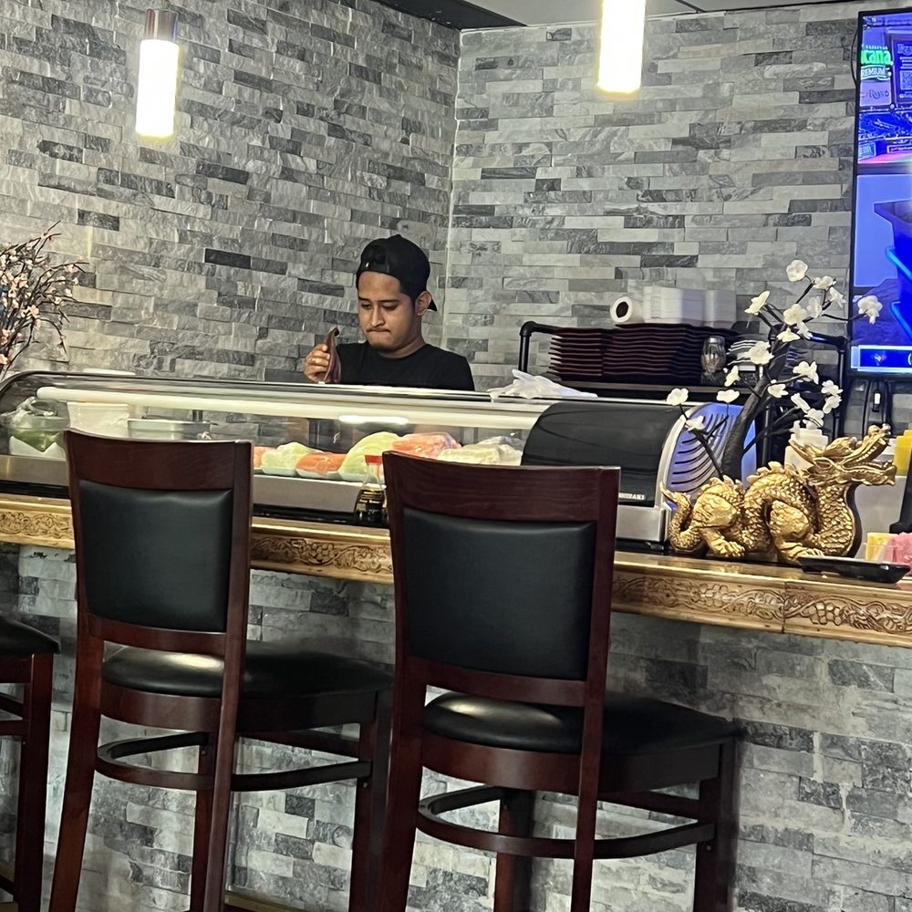 Umai Sushi - Worker touching food with his bare heads... yuck - Sushi Bars Near Me - Largo, Florida Umai Sushi - Worker touching food with his bare heads... yuck - Sushi Bars Near Me - Largo, Florida