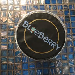 a close up of a blueberry logo a close up of a blueberry logo
