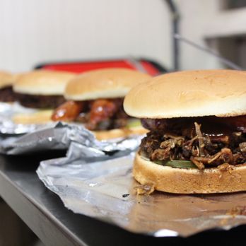 Pioneer BBQ - two burgers on tin foil - Barbeque Near Me - Nixon, Texas