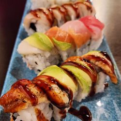 One Piece Sushi - Spicy Salmon Roll (3pc) Rainbow Roll (4pc)