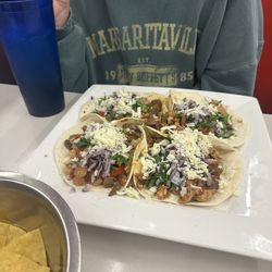 Toro's mexican grill - Tacos Vaqueros: shrimp, bacon, steak, chicken-I ordered flour tortilla's. Large tacos! Shared and still had two to take home.