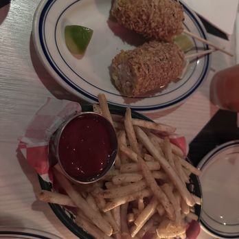 Miss Lily's 7A Cafe - Jerk Corn and Shoestring fries (Happy hour menu) - Caribbean Near Me - New York, New York Miss Lily's 7A Cafe - Jerk Corn and Shoestring fries (Happy hour menu) - Caribbean Near Me - New York, New York