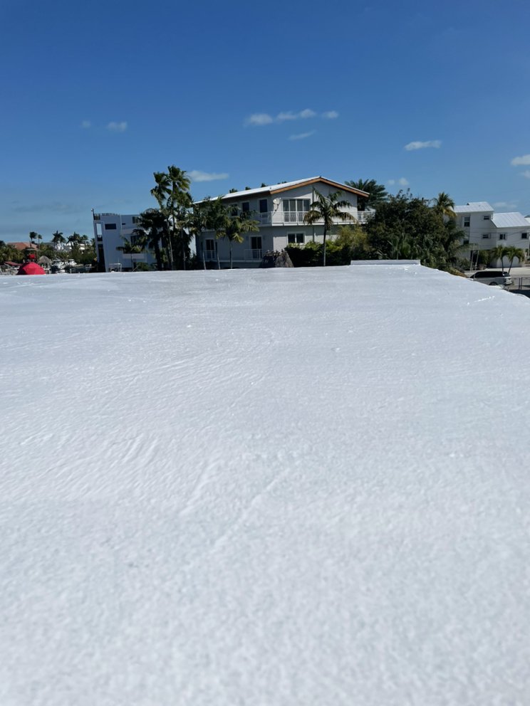 Slide of Andy The Roofer & Co