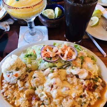 La Laguna Mariscos and Sushi - Shrimp dish with a side of salad and white rice mixed with vegetables. - Sushi Bars Near Me - Laredo, Texas La Laguna Mariscos and Sushi - Shrimp dish with a side of salad and white rice mixed with vegetables. - Sushi Bars Near Me - Laredo, Texas