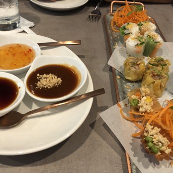 Ka Thai - Appetizer sampler, dumplings, spring rolls and Kratong tong. Dumpling were the winner. Loves all the sauces. - Thai Near Me - Dallas, Texas