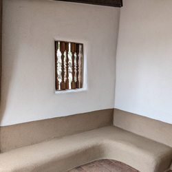 Tesuque Stucco Company - Banco area on front porch