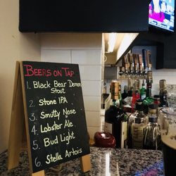 Garden Grille & Bar - Tap list and partial bar shot