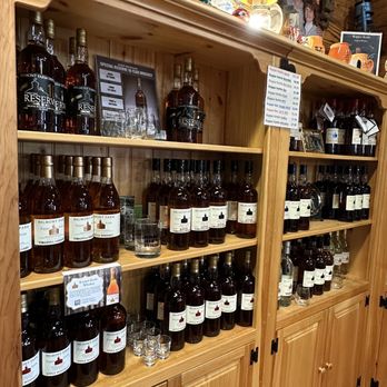 Belmont Farm Distillery - shelves full of bottles of liquor - Distilleries Near Me - Culpeper, Virginia