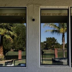 Ruthless Cleaners - Had to get a panorama of these beautiful windows and the pretty golf course behind them.