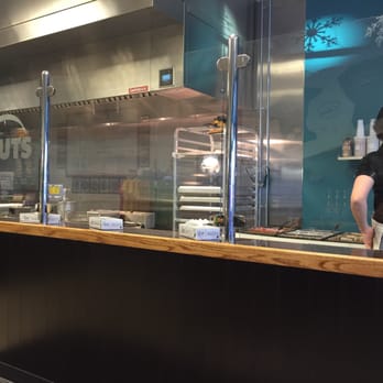 O's Donuts - Pretty cool to watch your donut get made, frosted and topped with yumminess! - Donuts Near Me - Norfolk, Virginia