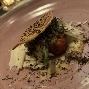 Sepia - Crispy cream cheese gnudi with fresh shaved parmigiana, Australian summer truffles, and tuille. - New American Near Me - Chicago, Illinois Sepia - Crispy cream cheese gnudi with fresh shaved parmigiana, Australian summer truffles, and tuille. - New American Near Me - Chicago, Illinois