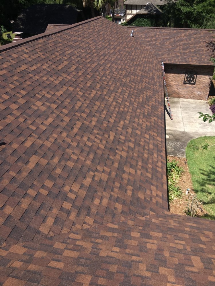 Slide of Waylon's Watertight Roofing