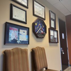 Phoenix Neurology & Sleep Medicine - Dr Anderson's certifications, accomplishments & service on display in office lobby.