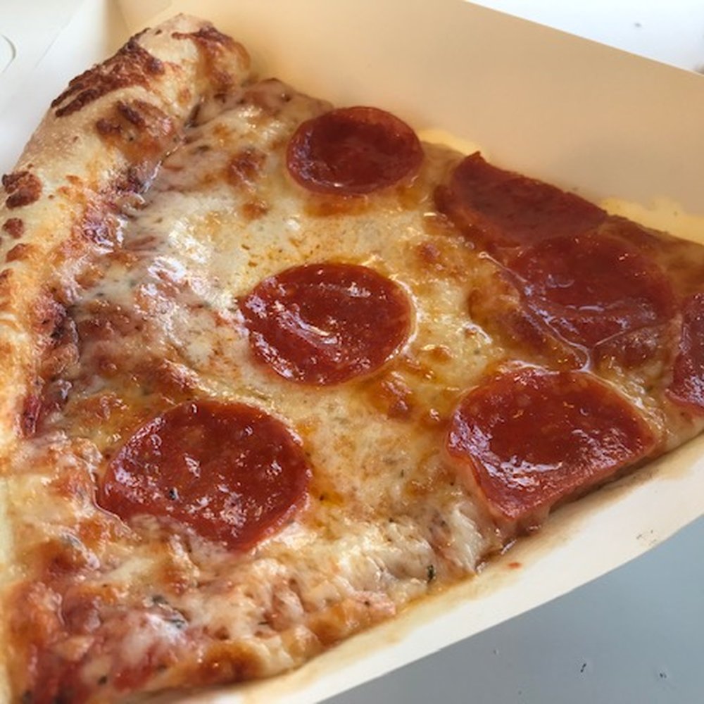 Hotspot Pizza - Slice of pepperoni. It's a huge slice with a lot of flavor (and a lot of grease). Pretty darn good (but also $4.50 per slice). - Pizza Near Me - Huntington Beach, California Hotspot Pizza - Slice of pepperoni. It's a huge slice with a lot of flavor (and a lot of grease). Pretty darn good (but also $4.50 per slice). - Pizza Near Me - Huntington Beach, California