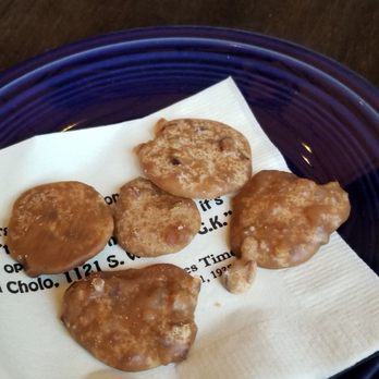El Cholo - Complimentary pralines post dessert. Chopped praline nuts poured over brown sugar, to form a cookie shape. Sweet and so darn good! - Mexican Near Me - Los Angeles, California El Cholo - Complimentary pralines post dessert. Chopped praline nuts poured over brown sugar, to form a cookie shape. Sweet and so darn good! - Mexican Near Me - Los Angeles, California