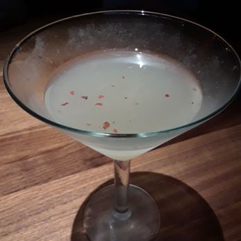 131 MAIN Restaurant - Paloma grapefruit tequila drink with pink peppercorn flakes floating on the top - New American Near Me - Charlotte, North Carolina 131 MAIN Restaurant - Paloma grapefruit tequila drink with pink peppercorn flakes floating on the top - New American Near Me - Charlotte, North Carolina