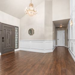 Redefined Finishes - We painted the this whole interior and added the chair railing and all the trim detail on the walls.