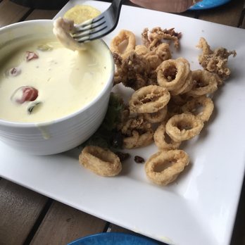 Tortuga's Kitchen & Bar - Calamari with a boatload of dip~ - Bars Near Me - Flagler Beach, Florida Tortuga's Kitchen & Bar - Calamari with a boatload of dip~ - Bars Near Me - Flagler Beach, Florida