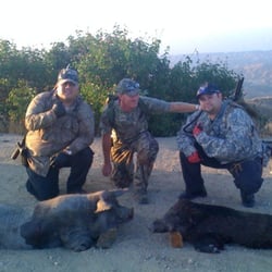 Big Horn Canyon Ranch - Hunting Ranch - 1 pig, 1 boar, 1 ram not bad for a days hunt...don't the ram pic