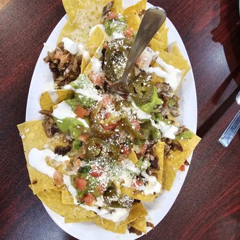 El Capitan Mariscos y Taqueria - Asada nachos - Mexican Near Me - Modesto, California El Capitan Mariscos y Taqueria - Asada nachos - Mexican Near Me - Modesto, California