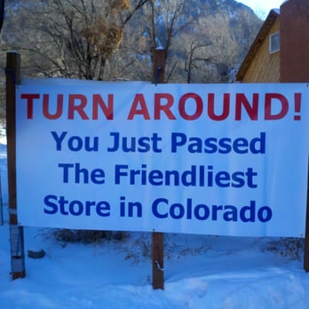 Sawpit Mercantile - a sign that reads turn around you just passed the friendliest store in colorado - Convenience Stores Near Me - Sawpit, Colorado