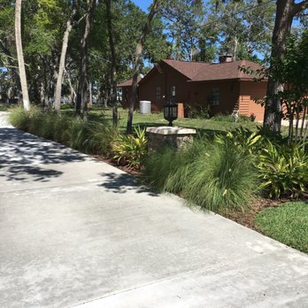 Bennett's Lawn Care - a house in the background - Landscaping Near Me - Ormond Beach, Florida