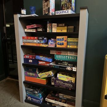 Tor Brewing - a bookshelf full of board games - Breweries Near Me - Wichita, Kansas