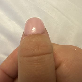 Papillon Nails & Spa - Right under the light glow you can see the missing top coat. - Nail Salons Near Me - Fullerton, California Papillon Nails & Spa - Right under the light glow you can see the missing top coat. - Nail Salons Near Me - Fullerton, California