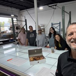 Sprinkles of Kindness, a delivery from Brandon Bagley's AG location in Phoenix, on National Doughnut Day, to our shiny new location! Thanks!
